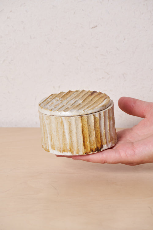 Low Box /  Narrow horizontal carved grooves with iron